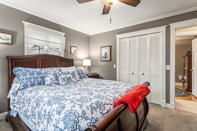 3313 Gethings Rd, Battle Creek, MI 49015 - bedroom featuring a closet, carpet flooring, ornamental molding, baseboards, and a ceiling fan