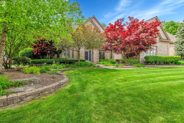 482 Torrington Dr W, Canton, MI 48188 - view of front of property with a front lawn and brick siding