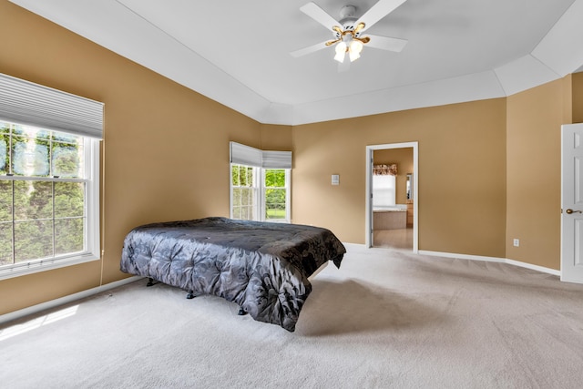 482 Torrington Dr W, Canton, MI 48188 - carpeted bedroom featuring baseboards, ensuite bath, and a ceiling fan
