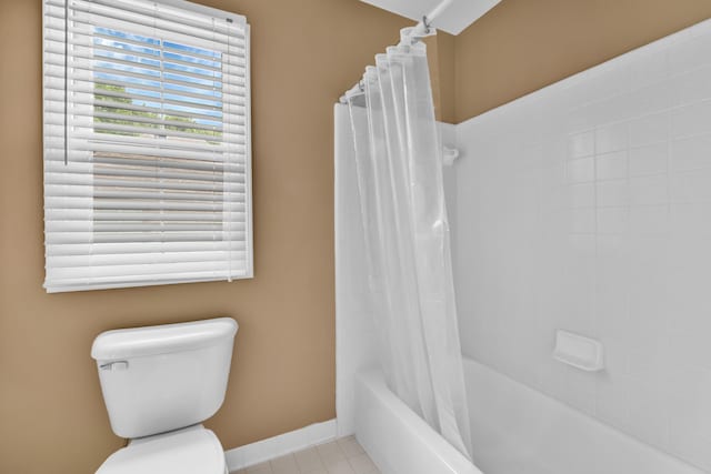 482 Torrington Dr W, Canton, MI 48188 - bathroom featuring toilet, baseboards, shower / bath combination with curtain, and tile patterned flooring