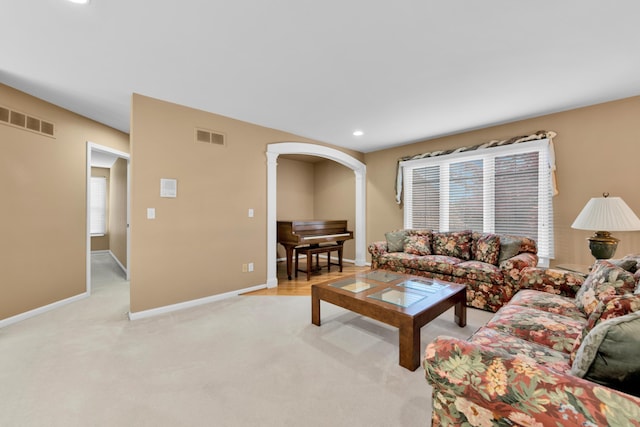 482 Torrington Dr W, Canton, MI 48188 - living room featuring light colored carpet, baseboards, healthy amount of natural light, and recessed lighting