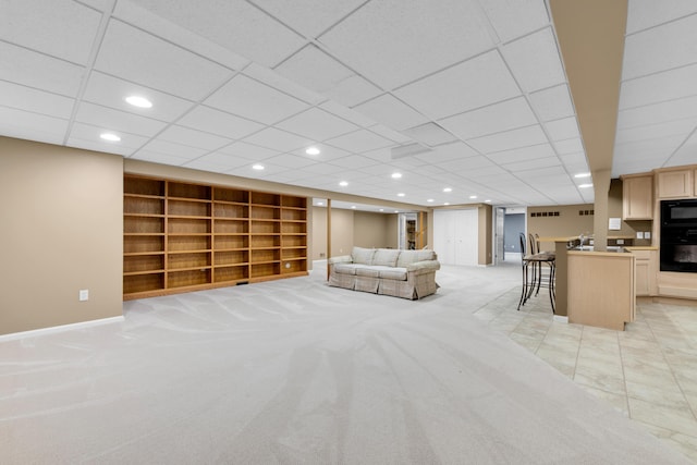 482 Torrington Dr W, Canton, MI 48188 - living room with light carpet, baseboards, built in features, and recessed lighting