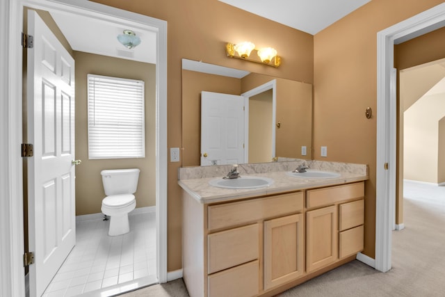 482 Torrington Dr W, Canton, MI 48188 - bathroom featuring double vanity, toilet, and baseboards