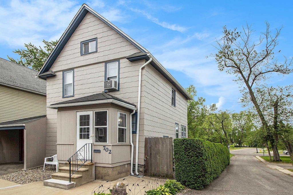 702 Portage Ct, Kalamazoo, MI 49001 - view of front of home with entry steps and cooling unit