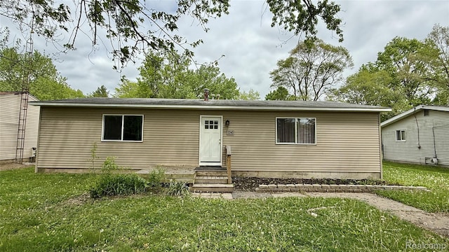 2243 Noble Ave, Flint, MI 48532 - view of front of house with a front lawn