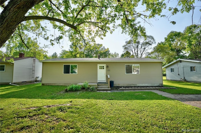 2243 Noble Ave, Flint, MI 48532 - view of front of property with entry steps and a front lawn