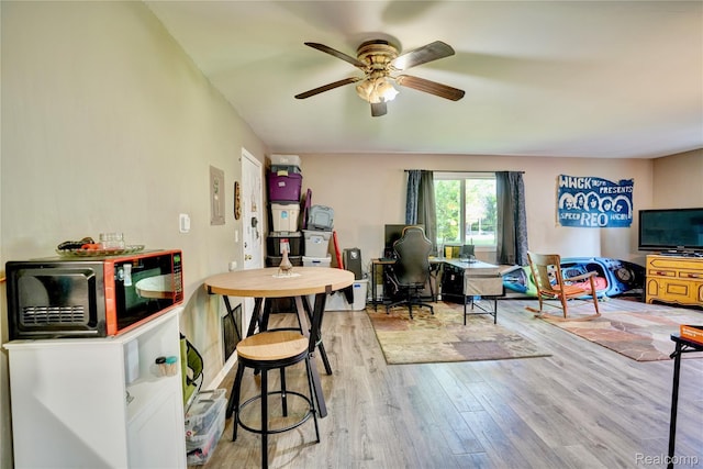 2243 Noble Ave, Flint, MI 48532 - living room with ceiling fan, a desk, and wood finished floors