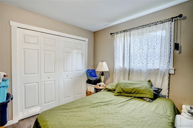 2243 Noble Ave, Flint, MI 48532 - bedroom featuring a closet and wood finished floors