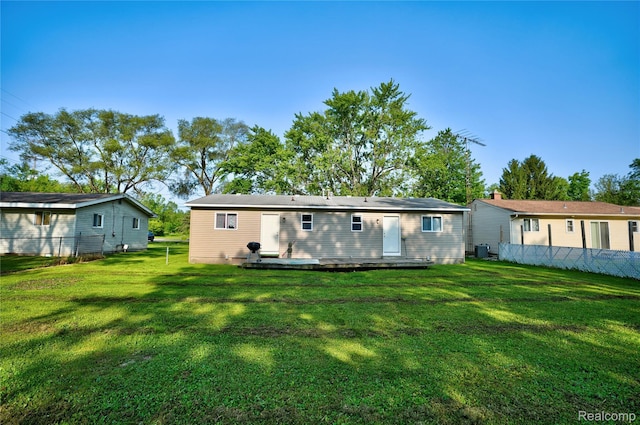 2243 Noble Ave, Flint, MI 48532 - rear view of house with central AC