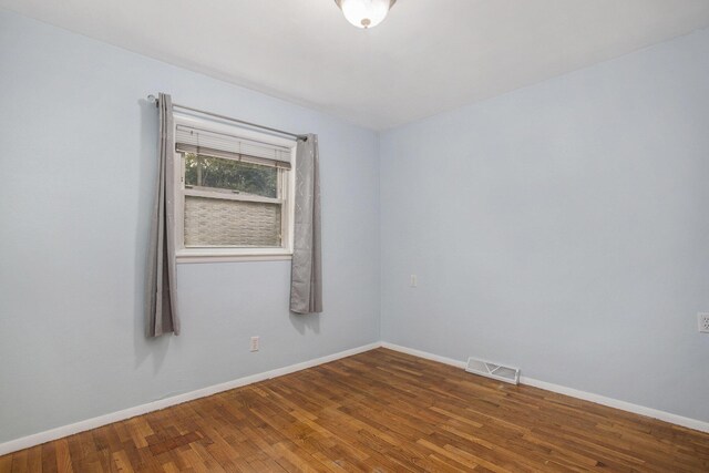 2013 Cumberland St, Kalamazoo, MI 49006 - empty room featuring wood finished floors and baseboards