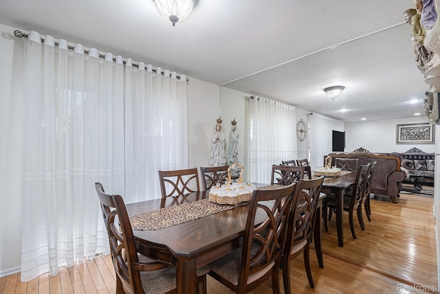 3365 Gloucester Dr, Sterling Heights, MI 48310 - dining room with light wood-style flooring