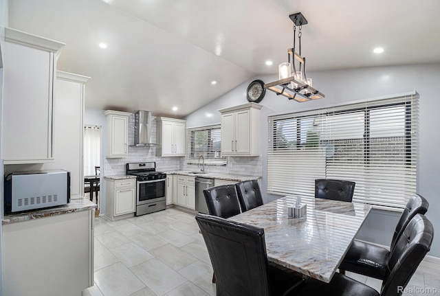 3365 Gloucester Dr, Sterling Heights, MI 48310 - dining area featuring lofted ceiling and recessed lighting