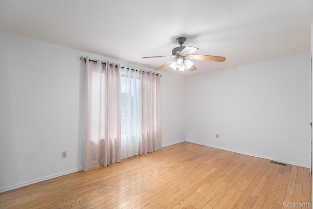 3365 Gloucester Dr, Sterling Heights, MI 48310 - empty room with ceiling fan, light wood-type flooring, and baseboards