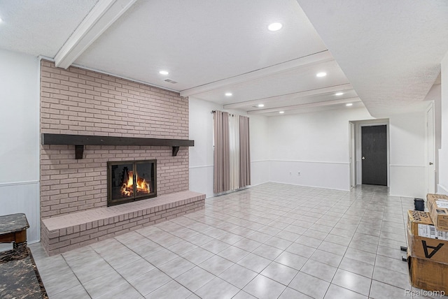 3365 Gloucester Dr, Sterling Heights, MI 48310 - unfurnished living room with tile patterned floors, beamed ceiling, recessed lighting, a fireplace, and a textured ceiling