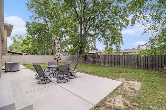 3365 Gloucester Dr, Sterling Heights, MI 48310 - view of patio with central air condition unit and outdoor dining space