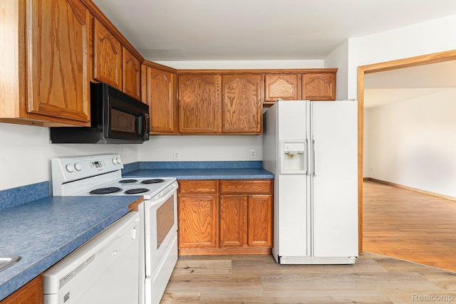 26809 Bonnie Ave, Warren, MI 48089 - kitchen with white appliances, brown cabinetry, and light wood-type flooring