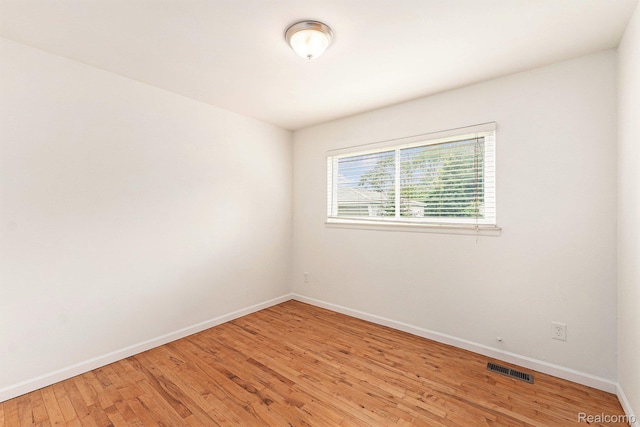 26809 Bonnie Ave, Warren, MI 48089 - spare room featuring baseboards and light wood-style flooring
