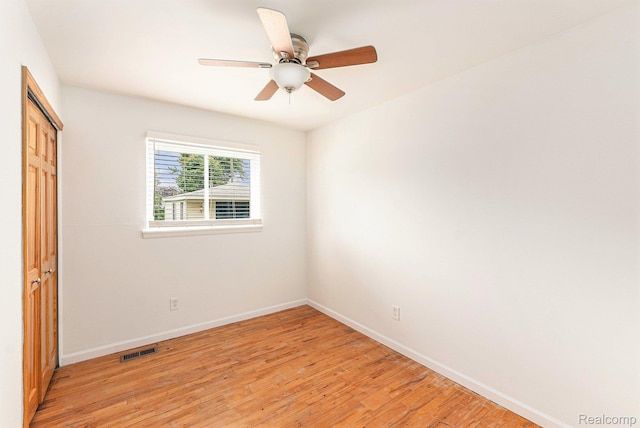 26809 Bonnie Ave, Warren, MI 48089 - unfurnished bedroom featuring light wood finished floors, baseboards, a closet, and ceiling fan