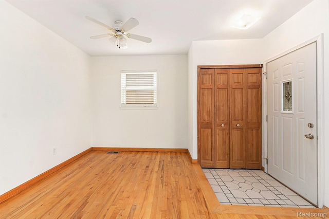 26809 Bonnie Ave, Warren, MI 48089 - unfurnished bedroom featuring baseboards, a closet, light wood-style flooring, and a ceiling fan