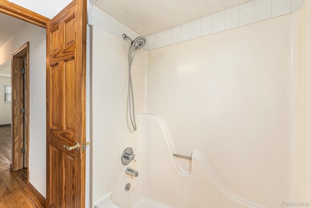 26809 Bonnie Ave, Warren, MI 48089 - bathroom featuring wood finished floors and  shower combination