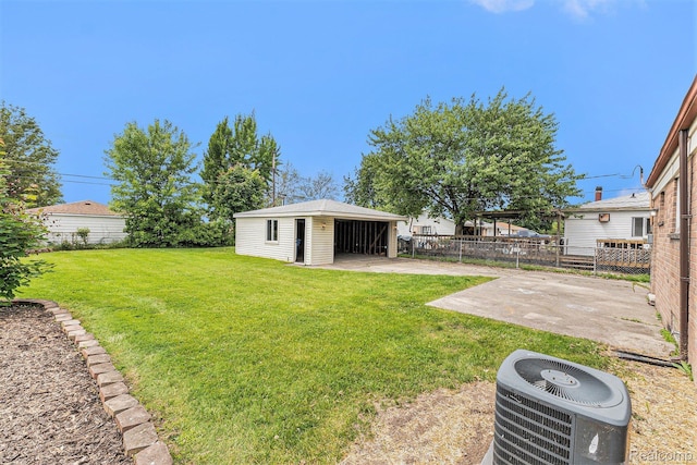 26809 Bonnie Ave, Warren, MI 48089 - view of yard featuring cooling unit, an outbuilding, and a patio