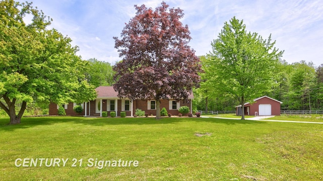 4769 S Fordney Rd, Hemlock, MI 48626 - view of front of house with a detached garage, brick siding, and an outdoor structure