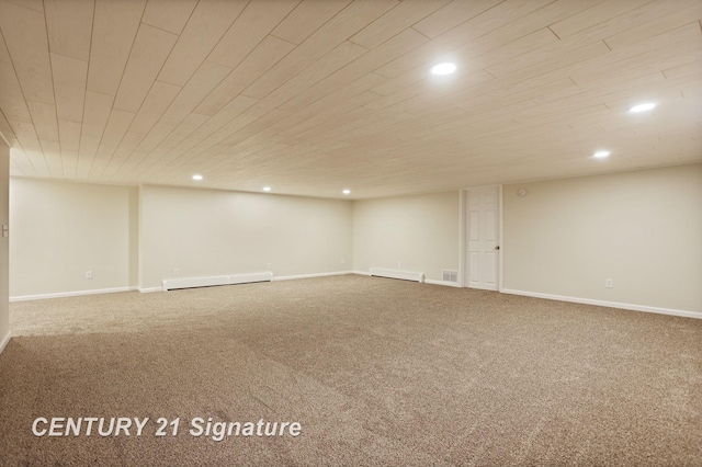 4769 S Fordney Rd, Hemlock, MI 48626 - finished basement featuring a baseboard radiator, recessed lighting, carpet, baseboards, and wood ceiling