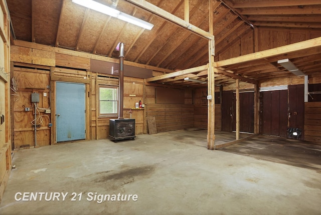 4769 S Fordney Rd, Hemlock, MI 48626 - below grade area with a wood stove