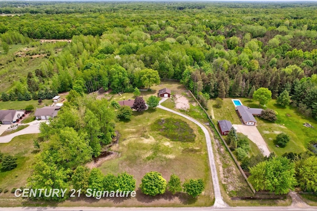 4769 S Fordney Rd, Hemlock, MI 48626 - drone / aerial view of a heavily wooded area
