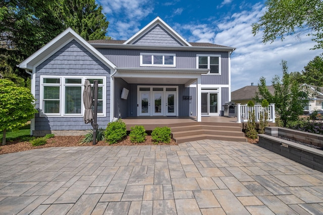 7899 W Royal Rd, Canadian Lakes, MI 49346 - back of house with french doors and a wooden deck
