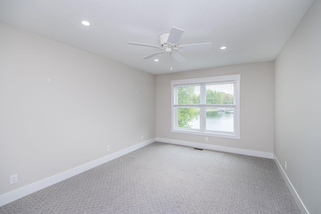 7899 W Royal Rd, Canadian Lakes, MI 49346 - empty room with carpet flooring, recessed lighting, and a ceiling fan