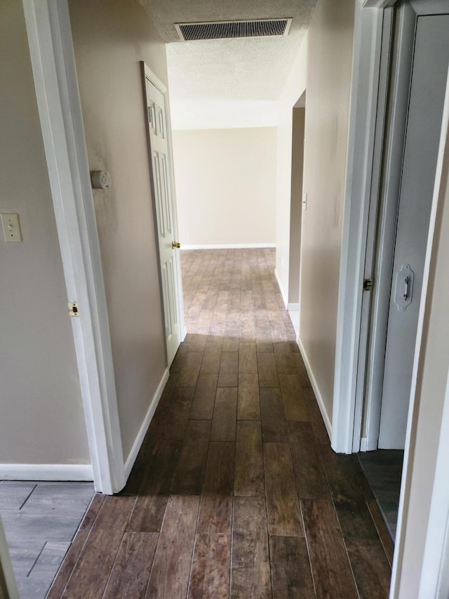 179 W State St, Coldwater, MI 49036 - corridor with dark wood-style floors