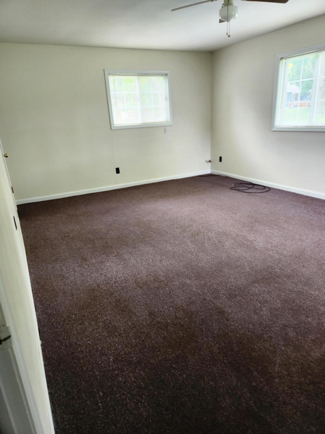 179 W State St, Coldwater, MI 49036 - carpeted spare room featuring ceiling fan and baseboards
