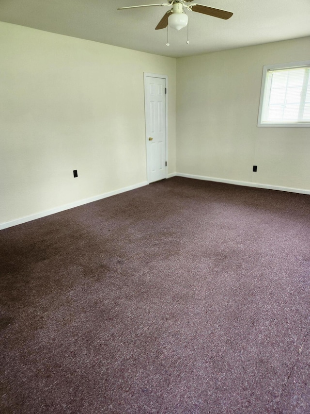 179 W State St, Coldwater, MI 49036 - unfurnished room featuring a ceiling fan and dark carpet