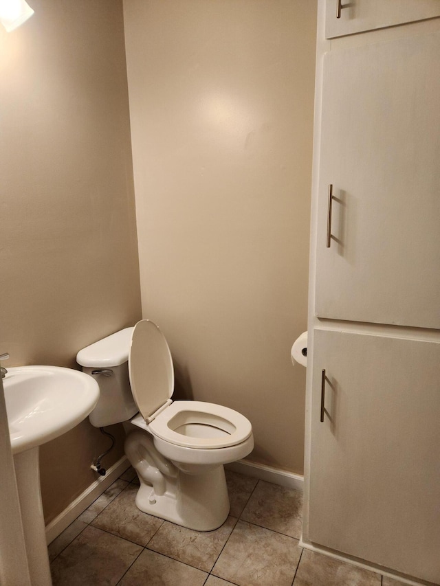 179 W State St, Coldwater, MI 49036 - bathroom with tile patterned floors