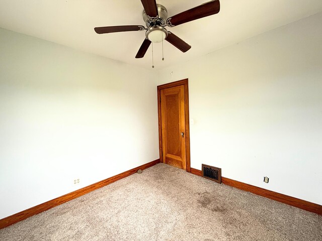 11250 Bristol Rd, Lennon, MI 48449 - empty room with light colored carpet, baseboards, and ceiling fan