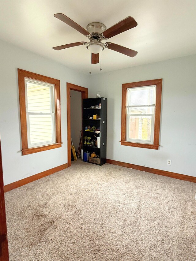 11250 Bristol Rd, Lennon, MI 48449 - spare room with carpet flooring, ceiling fan, and baseboards