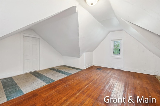 19250 Charest St, Detroit, MI 48234 - additional living space featuring lofted ceiling and hardwood / wood-style flooring