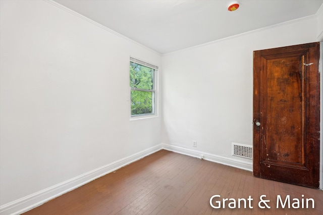 19250 Charest St, Detroit, MI 48234 - unfurnished room with hardwood / wood-style flooring, baseboards, and crown molding