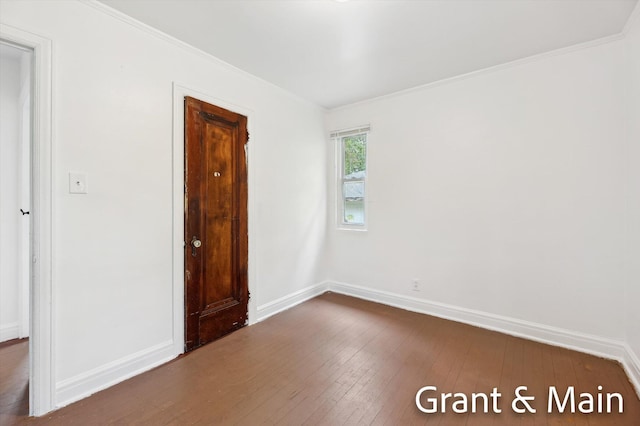 19250 Charest St, Detroit, MI 48234 - empty room with dark wood-style floors, baseboards, and crown molding