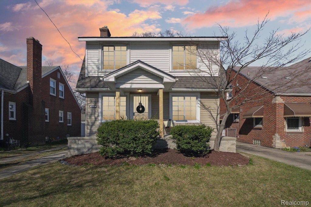 16159 Archdale St, Detroit, MI 48235 - view of front of house with a front lawn