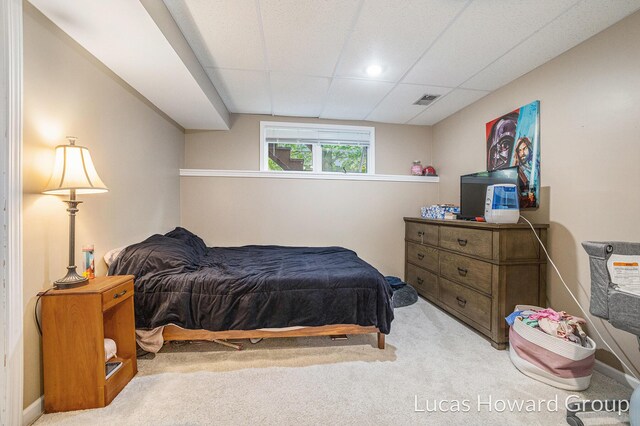 8535 Elkwood Dr SW, Byron Center, MI 49315 - bedroom with carpet floors and a drop ceiling