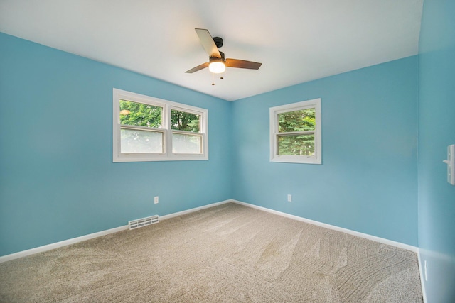 188 Redman Rd, Milan, MI 48160 - empty room with healthy amount of natural light, a ceiling fan, and baseboards