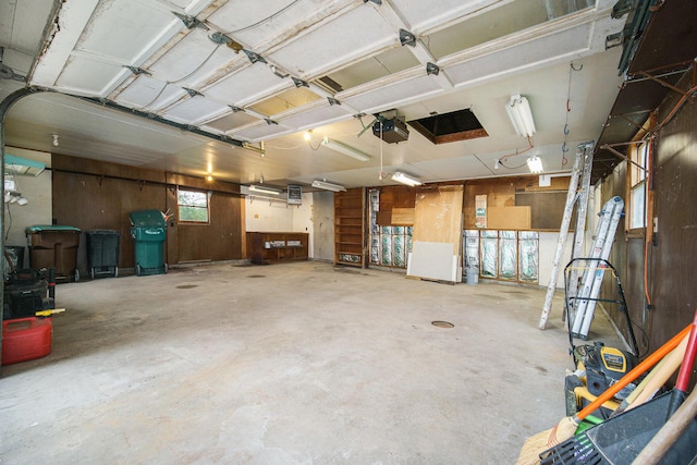 188 Redman Rd, Milan, MI 48160 - garage featuring a garage door opener