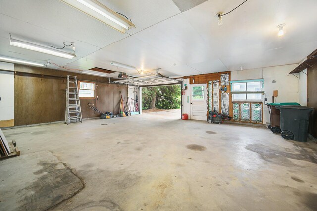 188 Redman Rd, Milan, MI 48160 - garage featuring a garage door opener