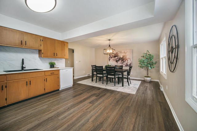 188 Redman Rd, Milan, MI 48160 - kitchen featuring a sink, white dishwasher, dark wood-type flooring, and baseboards
