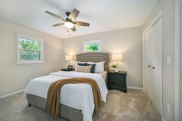 188 Redman Rd, Milan, MI 48160 - carpeted bedroom with baseboards, a closet, and a ceiling fan