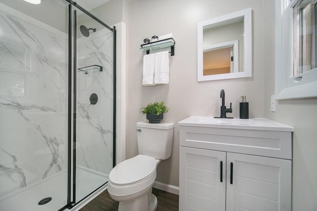 188 Redman Rd, Milan, MI 48160 - full bathroom with toilet, a marble finish shower, vanity, and wood finished floors