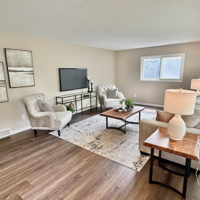 188 Redman Rd, Milan, MI 48160 - living area with wood finished floors and baseboards