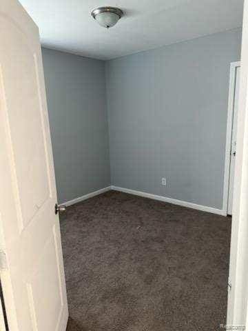 14557 Strathmoor St, Detroit, MI 48227 - carpeted spare room featuring baseboards